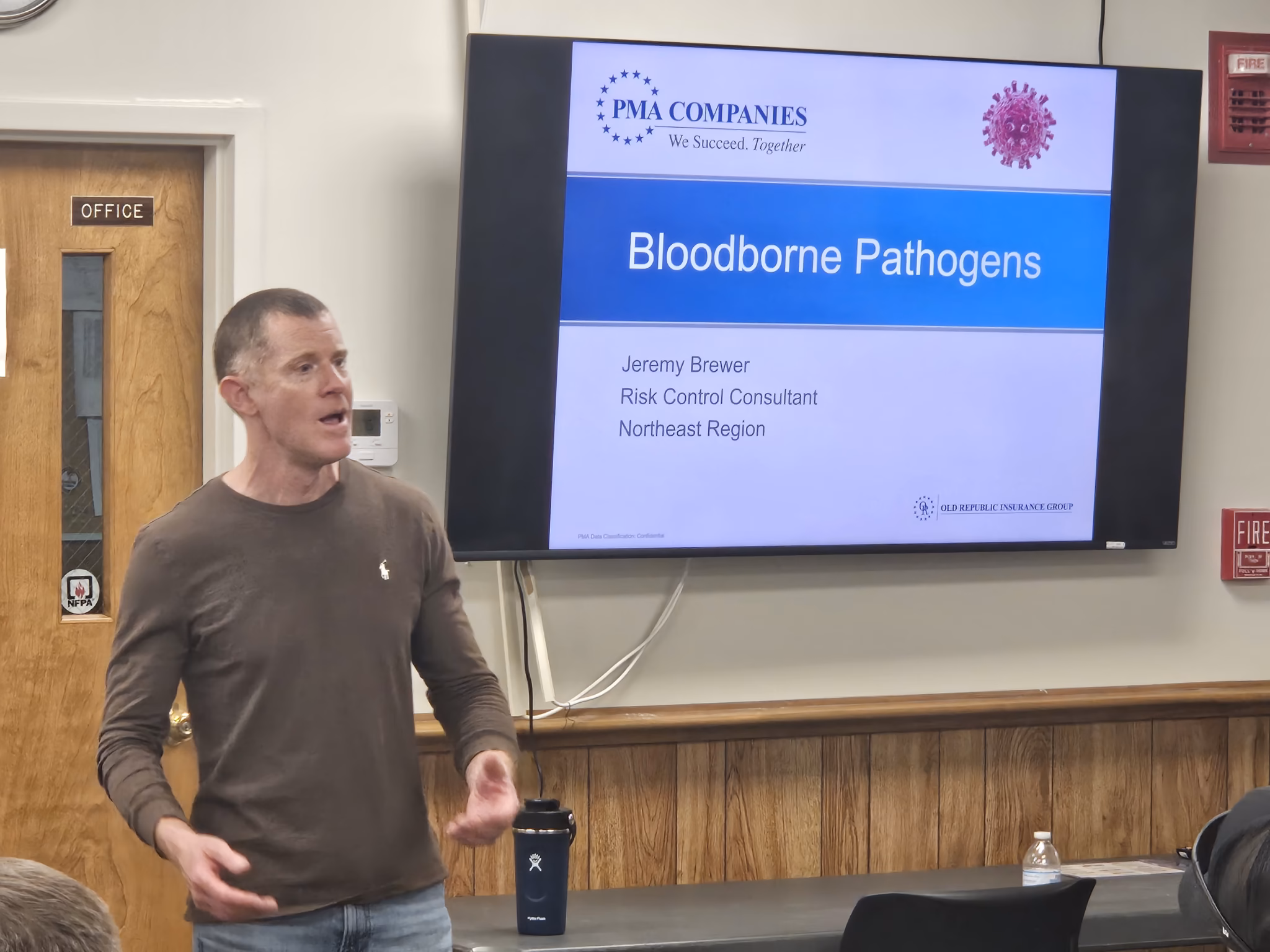 A guest instructor presents a bloodborne pathogens session